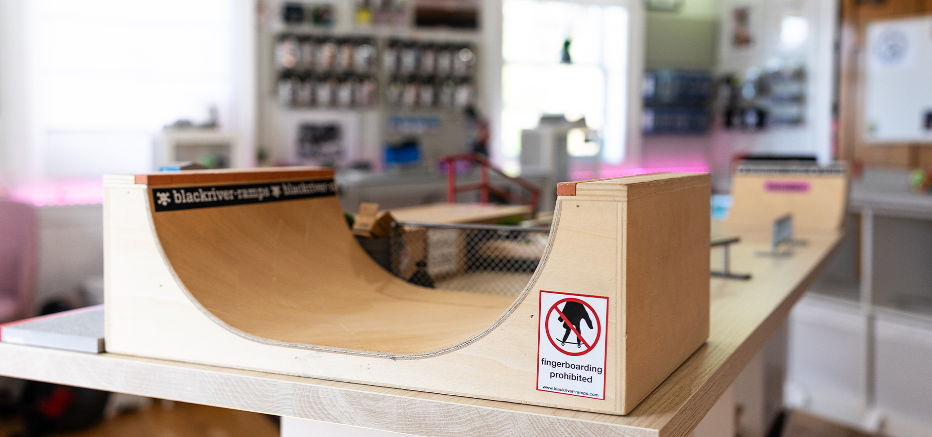 Custom-built indoor fingerboard park — full view